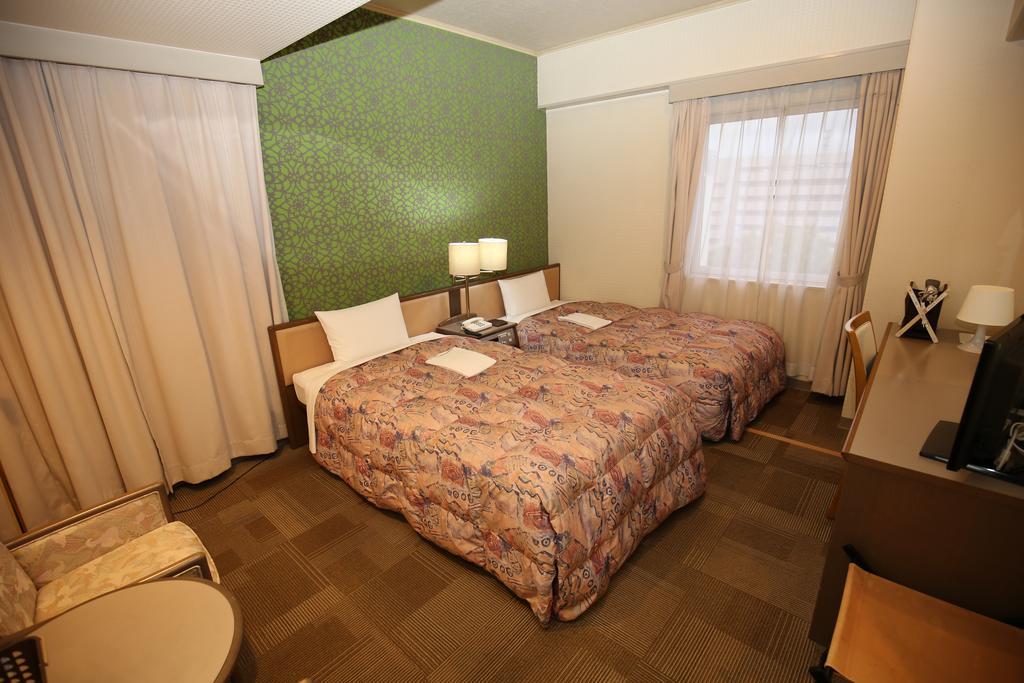 Apoa Hotel Йокаичи Екстериор снимка