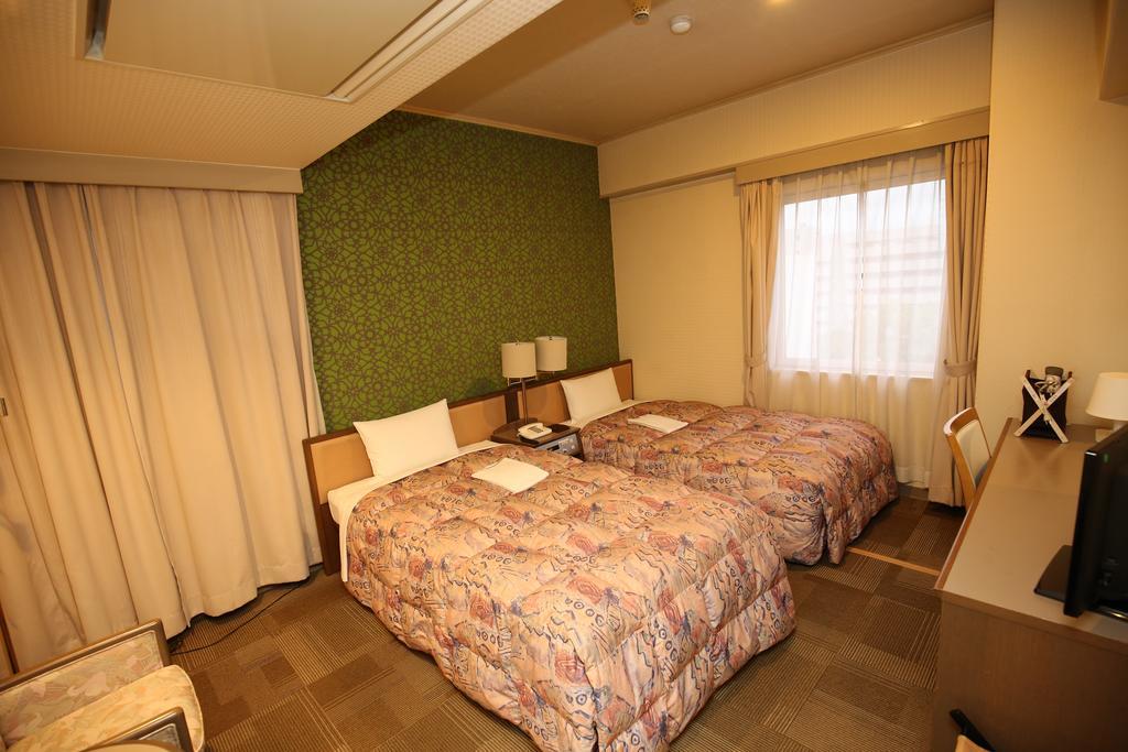 Apoa Hotel Йокаичи Екстериор снимка